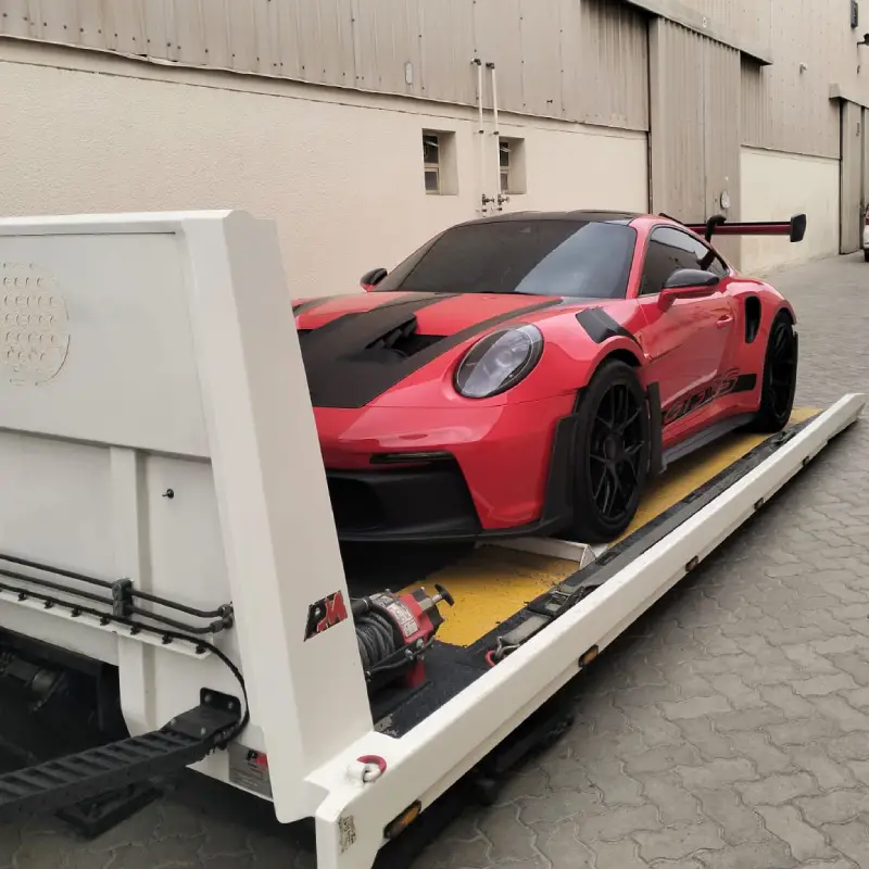 Tow truck assisting a vehicle in Dubai Marina